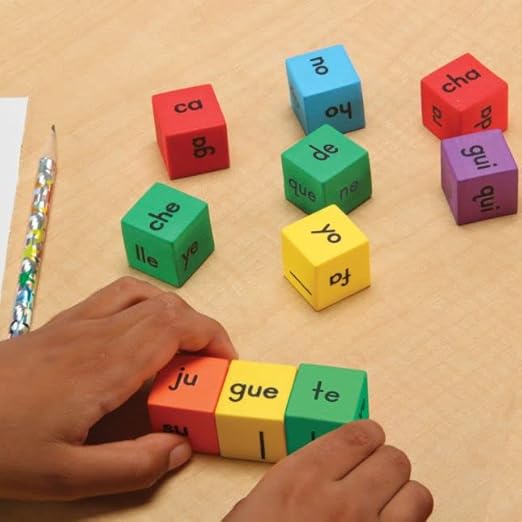 Really Good Stuff Make-a-Word Soft Touch Spanish Syllable Dice Game – Grades K–2 – Expand Word-Building Skills – Includes 15 Same-Vowel Syllable Dice, 3 Mixed-Vowel Dice – Dice Color-Coded by Vowel