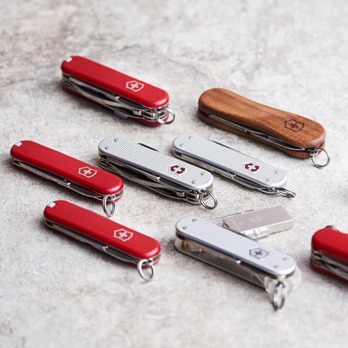 Victorinox Jetsetter Swiss Army Knife, Compact 7 Function Swiss Made Pocket Knife with Scissors, Magnetic Phillips Screwdriver and Key Ring – Red