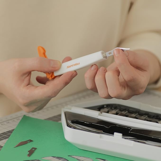 Fiskars Easy Change Medium Duty Precision Craft Knife Cutting and Carving Set, Softgrip and Ideal for Precise Cutting, Includes 12 blades, Orange/White